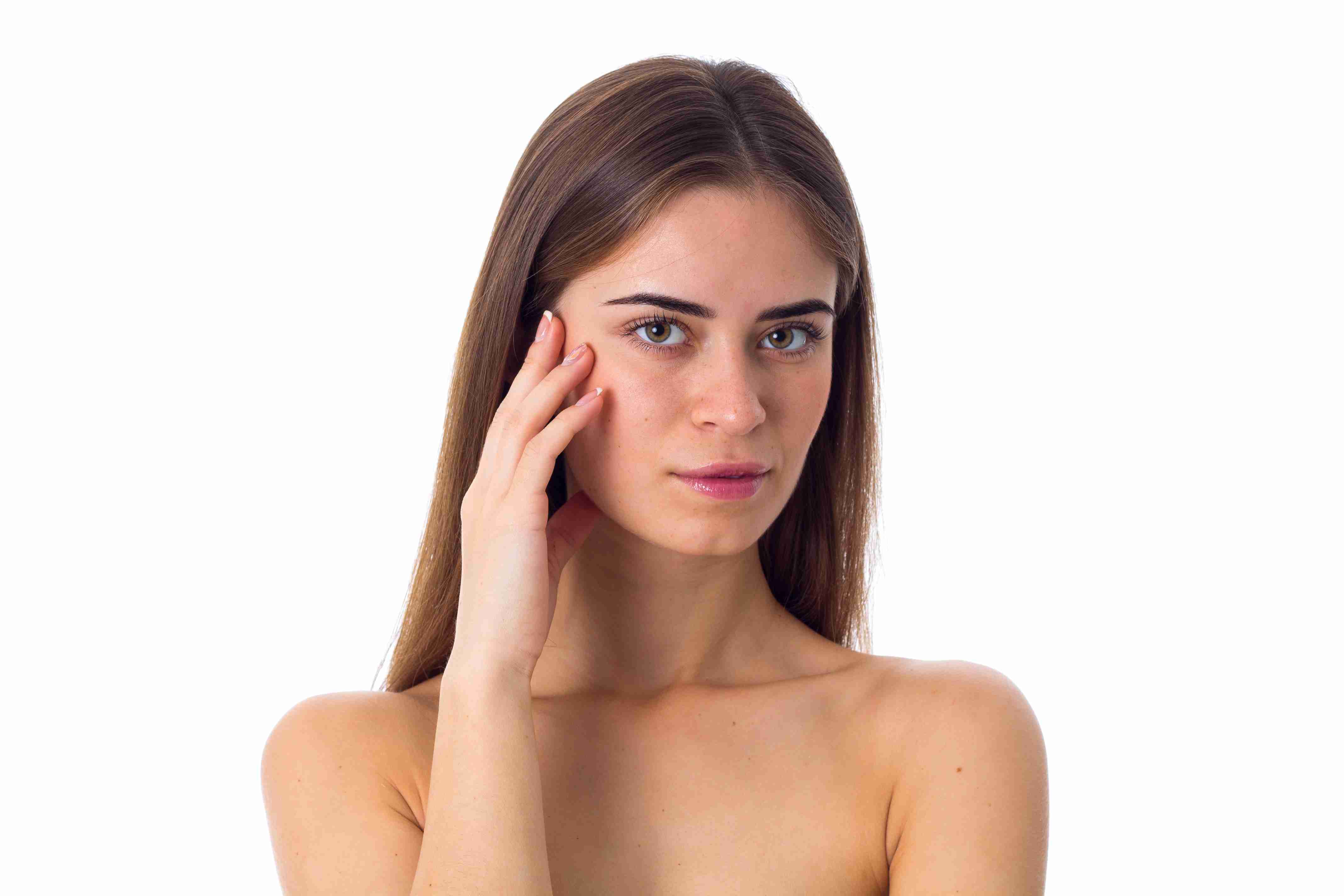 Woman using facial massage tools