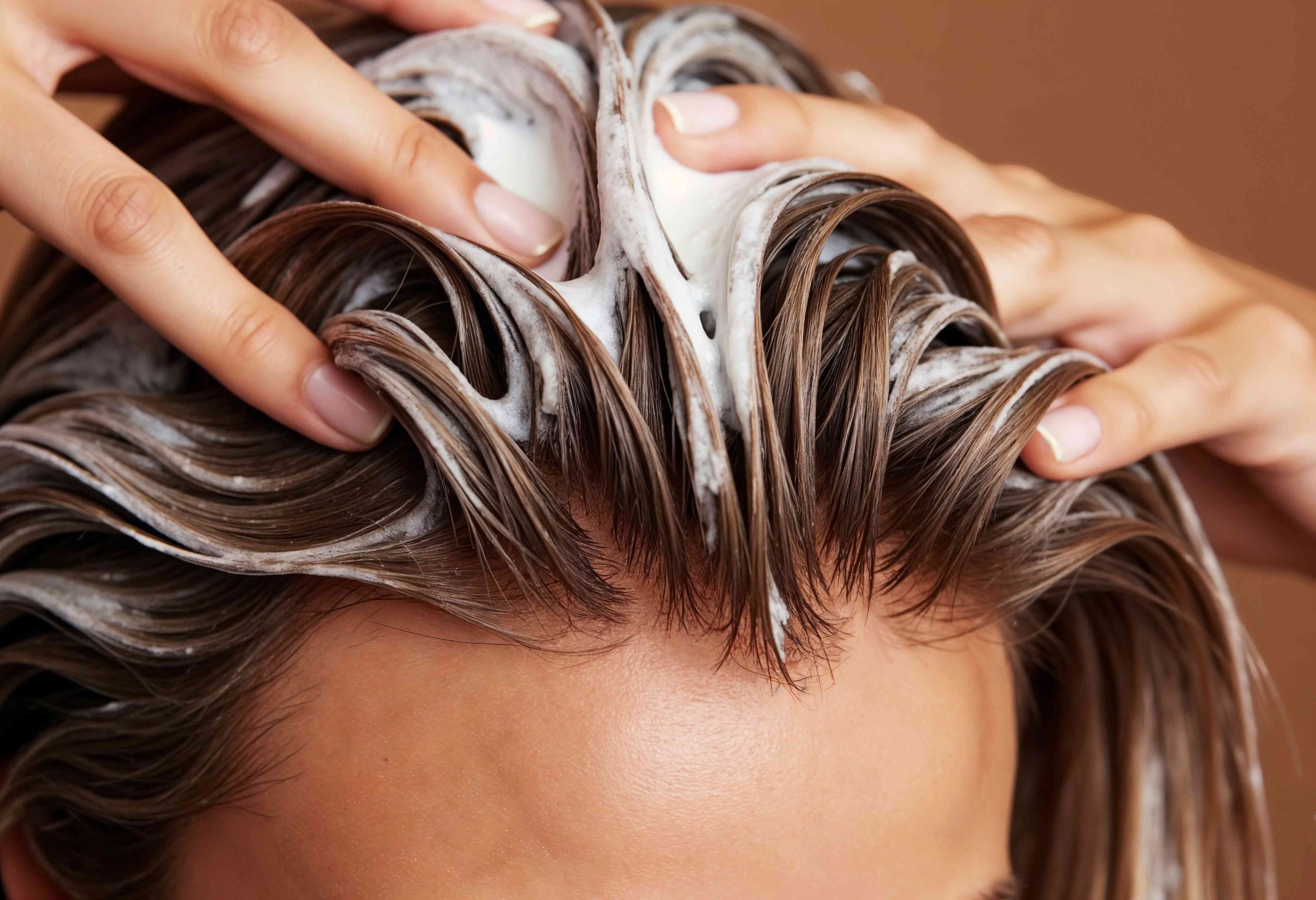 Woman using facial massage tools