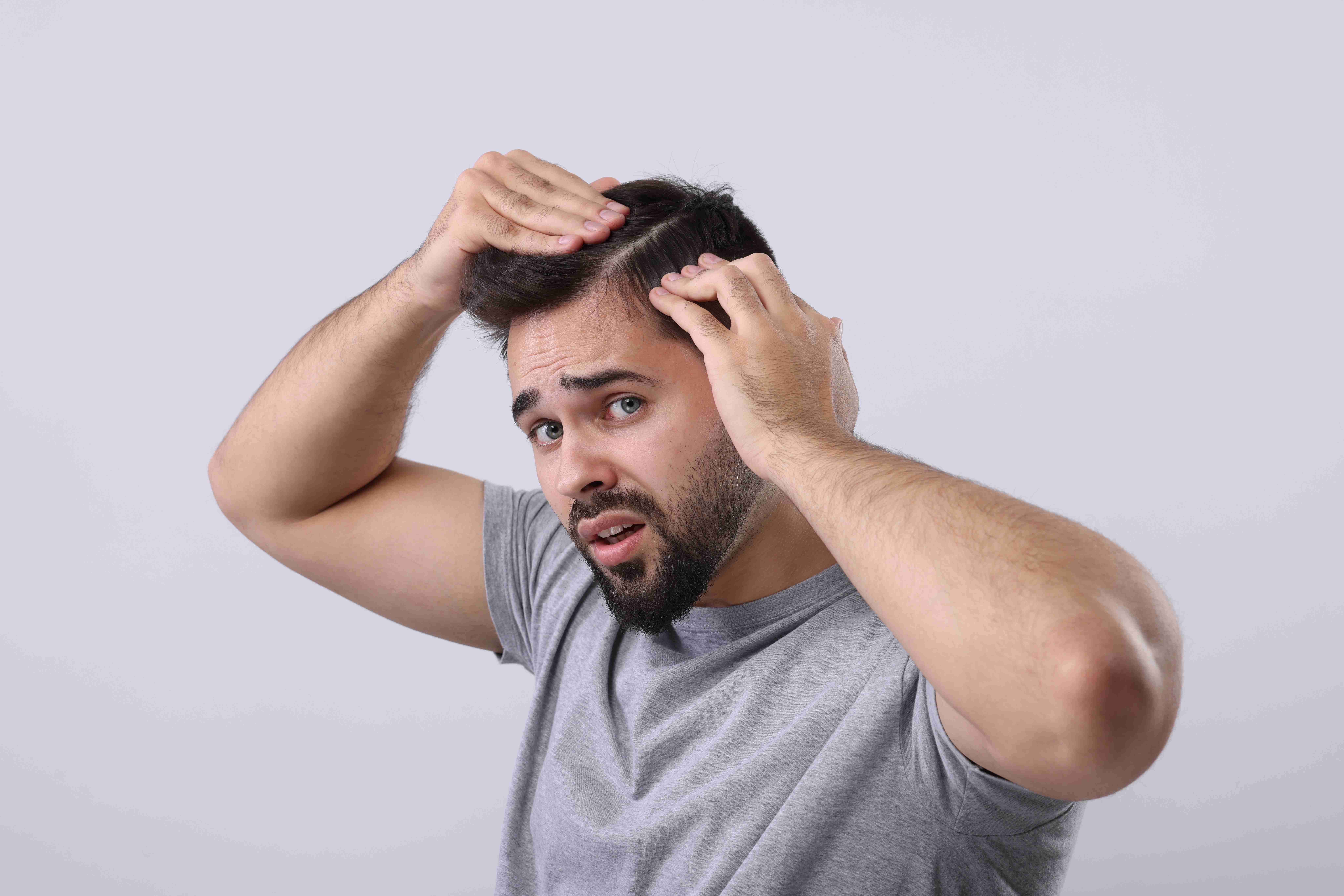 Woman using facial massage tools