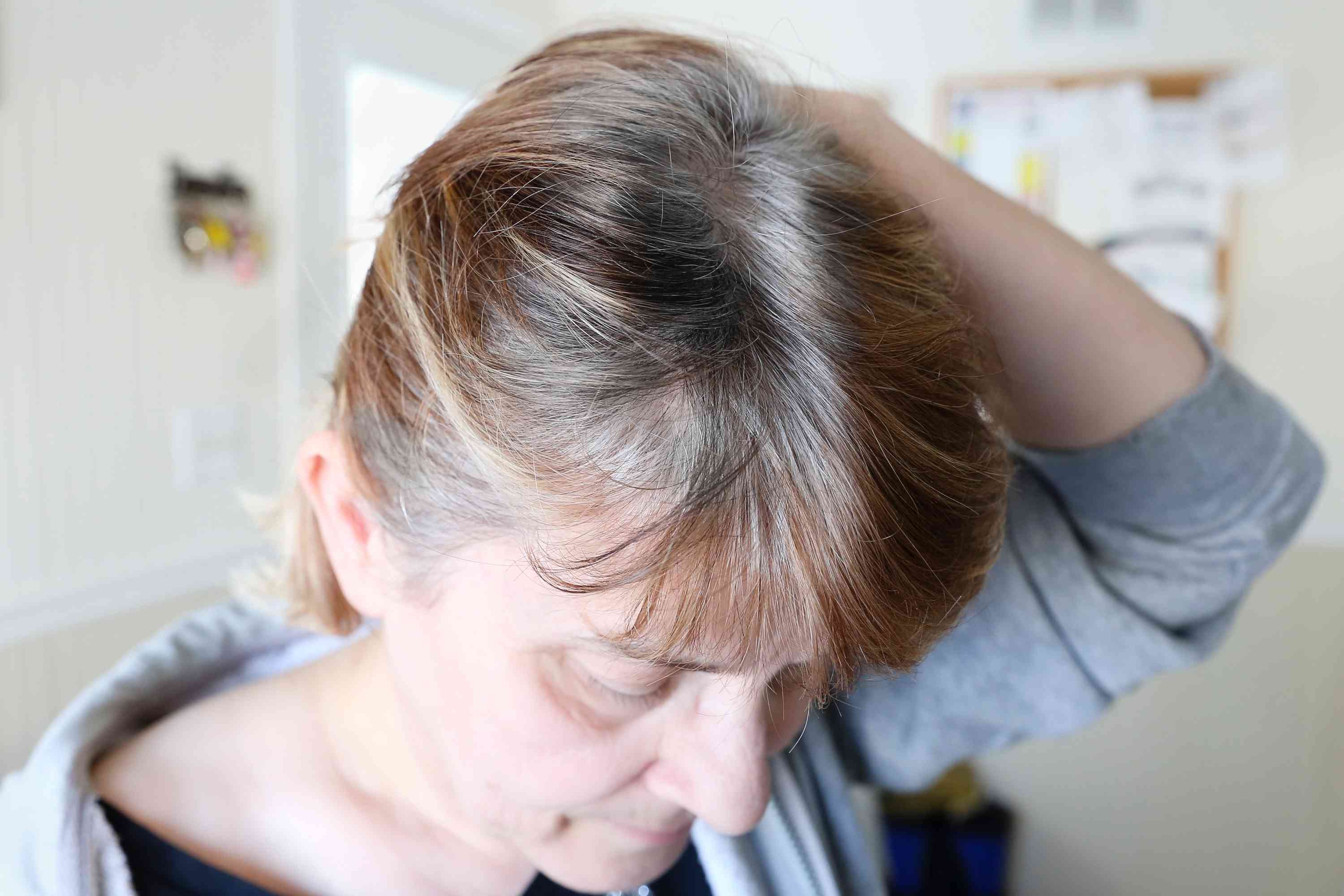 Greys mixed with natural black hair