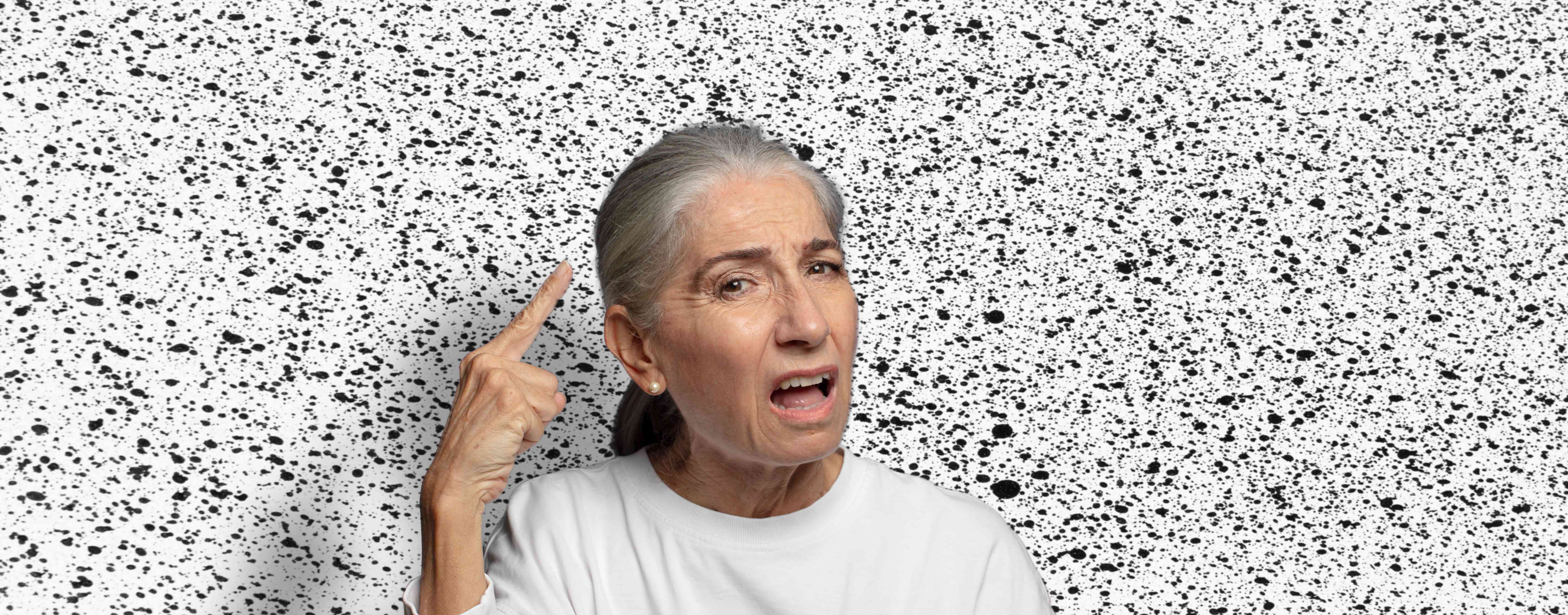 Dermatologist examining early grey strands