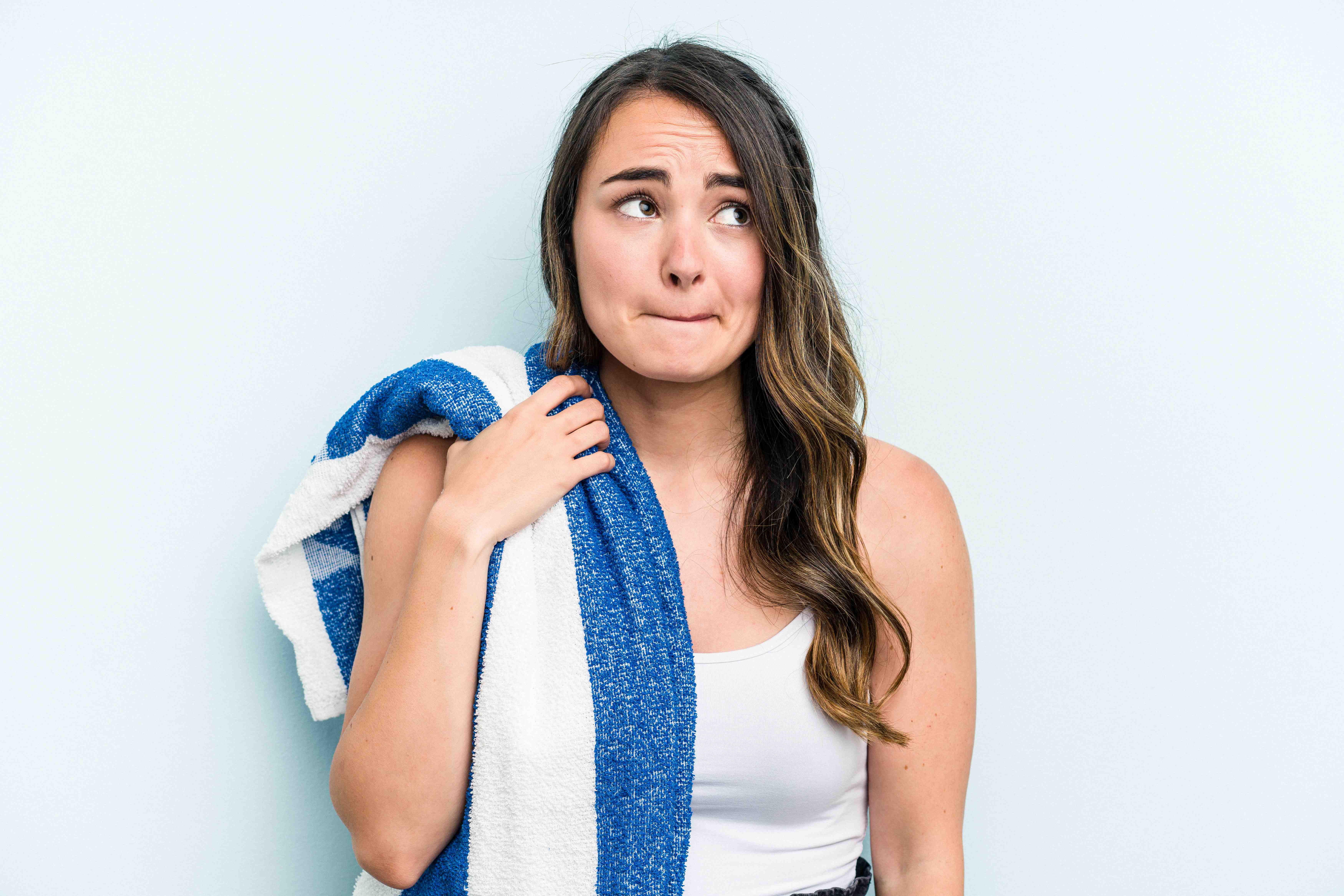 Woman using facial massage tools