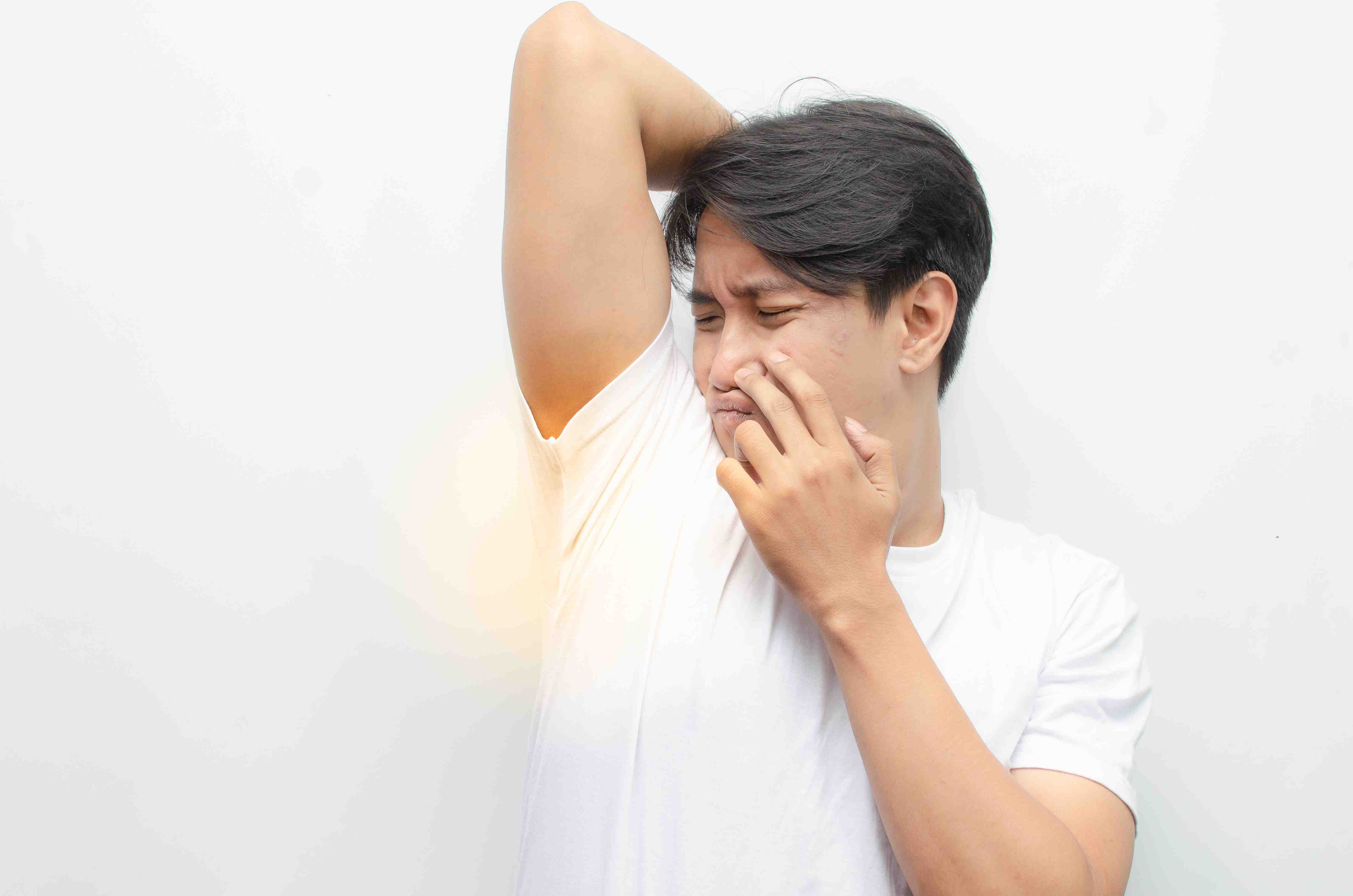 Excessive underarm sweating in a public setting