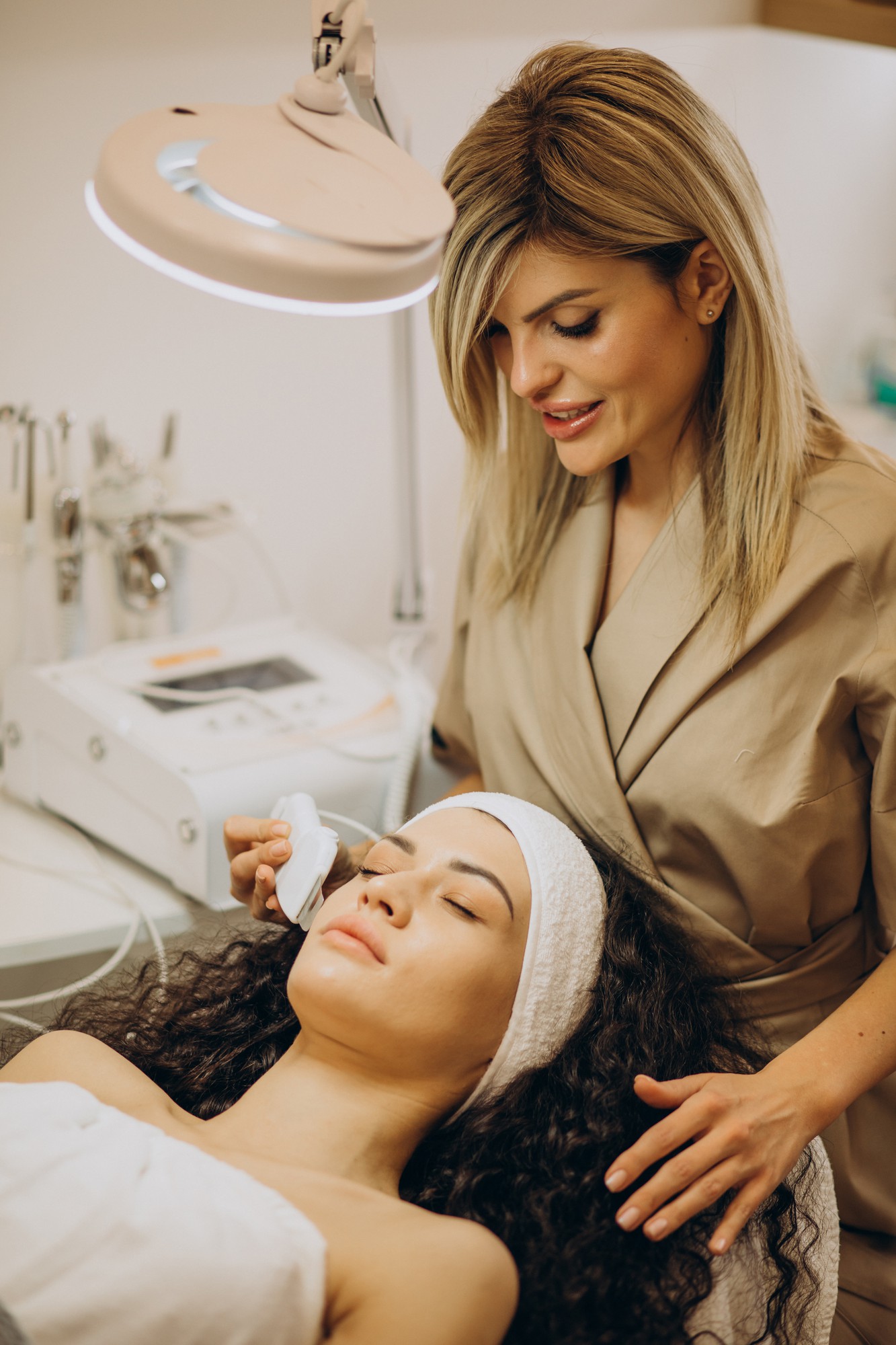 Dermatologist providing facial treatment