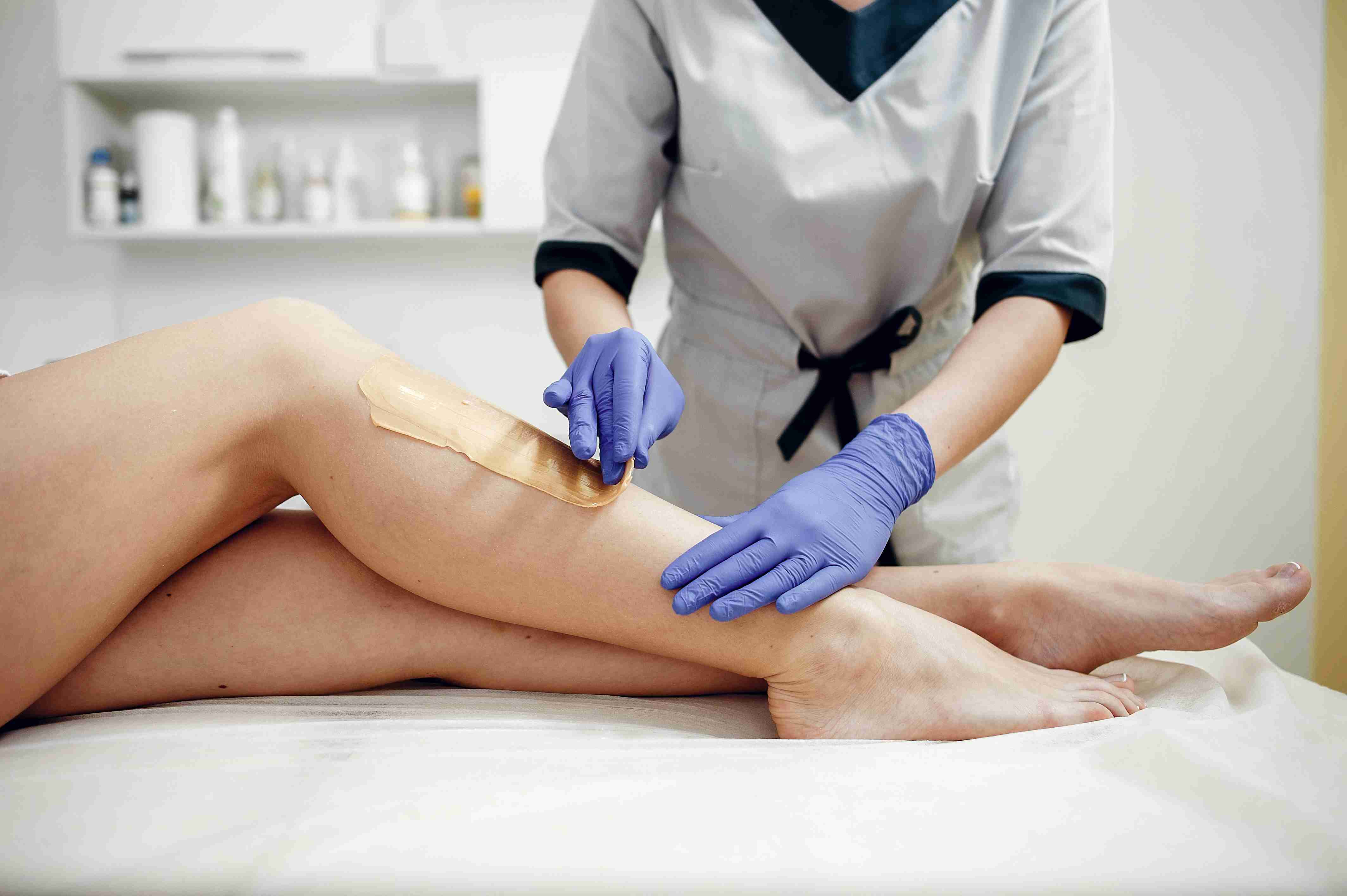Woman using facial massage tools
